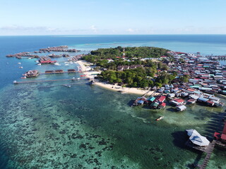 Drone view of Mabul Island, the base for diving in Sipadan Island, Sabah state in Malaysia.