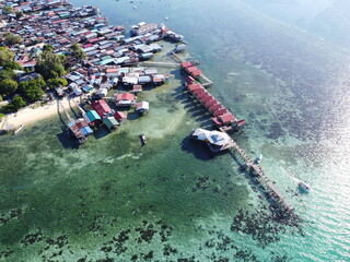 Drone view of Mabul Island, the base for diving in Sipadan Island, Sabah state in Malaysia.