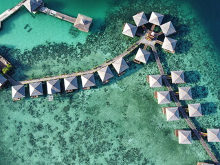 Drone view of Mabul Island, the base for diving in Sipadan Island, Sabah state in Malaysia.