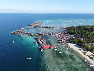 Drone view of Mabul Island, the base for diving in Sipadan Island, Sabah state in Malaysia.