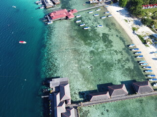 Drone view of Mabul Island, the base for diving in Sipadan Island, Sabah state in Malaysia.