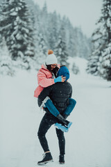 Fototapeta na wymiar On a snowy Valentine's Day, this romantic couple shares warmth, laughter, and tender embraces, creating a blissful winter love story.