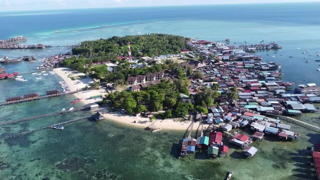Drone view of Mabul Island, the base for diving in Sipadan Island, Sabah state in Malaysia.