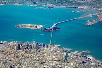 aerial of bay with downtown San Francisco and bay bridge