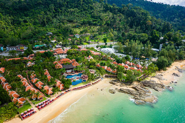 Aerial view of hotels and resorts next to the tropical Nangthong Beach in Khao Lak, Thailand