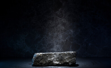 stones and ice for the podium. natural black stones in a thin layer of ice on a dark background for the presentation of a product cosmetics medicine perfumery jewelry - obrazy, fototapety, plakaty