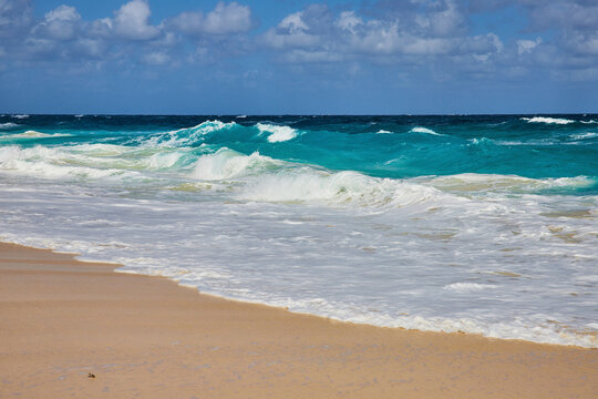 Turquoise Ocean Waves and Golden Sands on Bahamas Beach