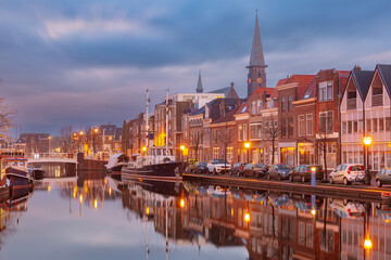 Fototapeta na wymiar Typical Leiden canal at night, South Holland, Netherlands
