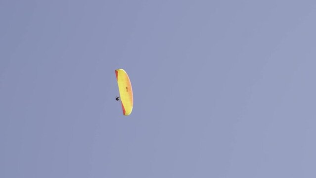 Paraglider in front of sky