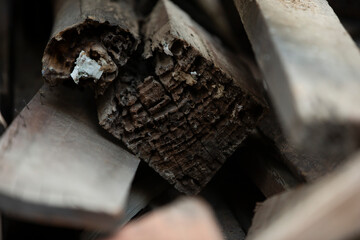 Close up of firewood in a pile. Abstract background and texture for design.