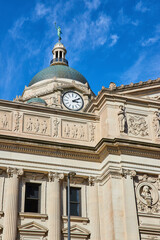 Fototapeta na wymiar Grand Courthouse Clock and Dome under Blue Sky