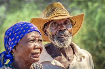 portrait of an village african american old couple in love , outdoors in a sunny day in the field