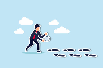 Business success footprint, aim high growth and surpass with bigger steps or career path or working skill development concept, smart businessman using magnifying glass investigating bigger foot steps.