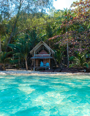 Koh Wai Island Trat Thailand near Koh Chang with a wooden bamboo hut bungalow on the beach