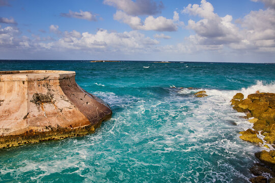 Curved Pier and Turquoise Waves, Bahamas - Coastal Seascape View