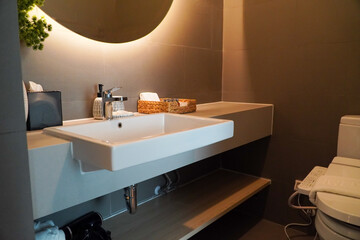 Minimal bathroom with modern furniture,Interior of a modern bathroom with sink and faucet.