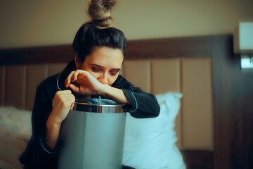 Sick Woman Feeling Nauseated in the Morning at Home. Pregnant girl suffering from morning sickness...