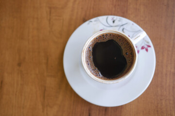 a cup of turkish coffee on table 