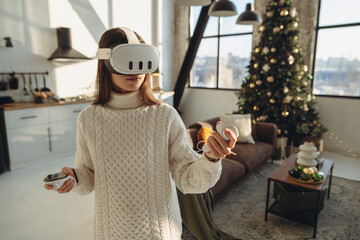 The girl, adorned in a VR headset, is narrating her virtual experiences.
