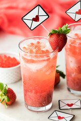 Refreshing strawberry lemonade with boba popping pearls, for Valentine's Day.