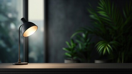 Modern stylish dark workspace tabletop with table lamp.