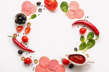 Frame made of fresh ingredients for preparing pizza on white background