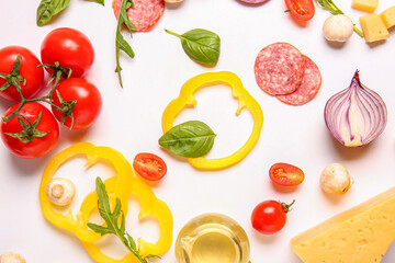 Ingredients for preparing pizza on white background