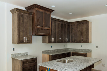 Building under construction new home with custom modular kitchen is cabinets island in center