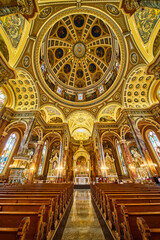 Fototapeta na wymiar Cathedral Interior with Gilded Dome and Stained Glass, Basilica of St Josaphat