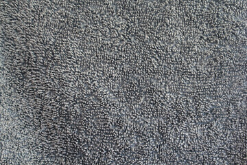 Fototapeta na wymiar Close up textured background of grey gray fabric cloth