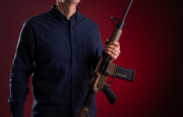 Armed citizen holding an AR rifle