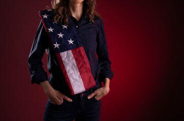 A woman with an American flag across her chest