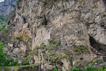 Panoramic view of the Dzivgis Fortress on a mountain slope