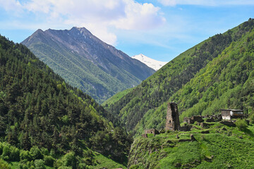Fototapeta na wymiar Ancient Ossetian ancestral tower in the Caucasus mountains