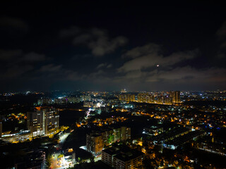 Fototapeta na wymiar Bangalore Nightscape: Glowing Skyscrapers Illuminate the City