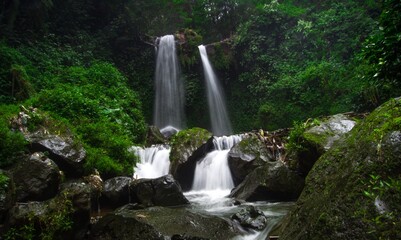 Naklejka premium two twin waterfalls with beauty