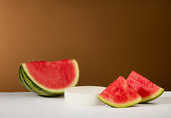 Natural cosmetic product concept with an empty podium decorated with fresh watermelon. Pastel minimal wall scene collection. Modern platform for product display presentation