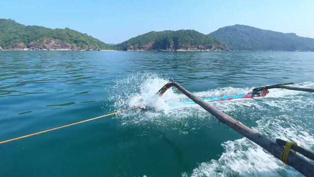 Oars of traditional fishing boat at ocean Goa in India 4K