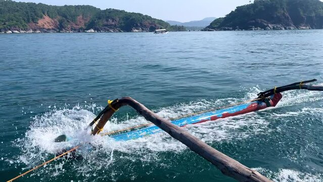 Close up shot of oars of traditional fishing boat at ocean Goa in India 4K