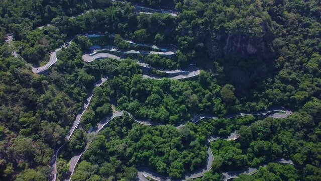Drone shot of Pollachi To Valparai scenic route road trip, Hairpin bends, Coimbatore, Tamil Nadu, South India