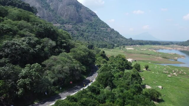 Drone shot of Pollachi Valparai road near Aliyar Reservoir and dam, Coimbatore, Tamil Nadu, South India
