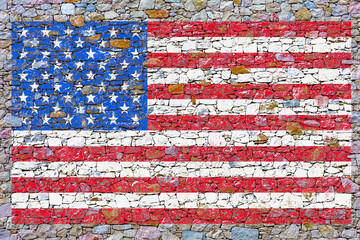 Drapeau américain peint sur mur de pierres 