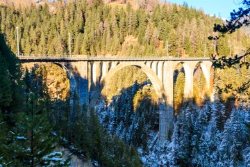 Photo sur Plexiglas Viaduc de Landwasser View of Wiesen Viaduct, Rhaetian railway, Graubunden in Switzerland at winter