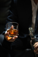 Barman pouring whiskey whiskey glass..
