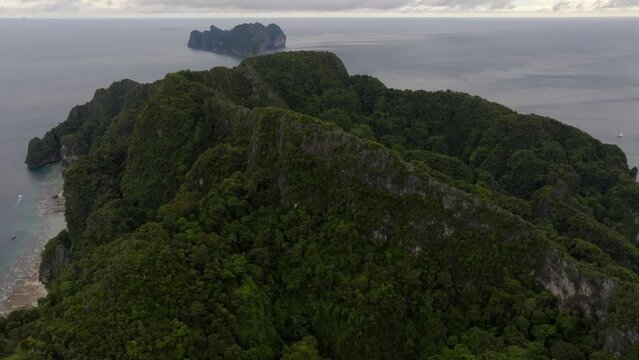 Drone footage from PhiPhi islands in Thailand footage of incredible Thai landscapes incredible nature with insane rocks, beaches, hills, ocean adn boats. Footage. filmed in 4k