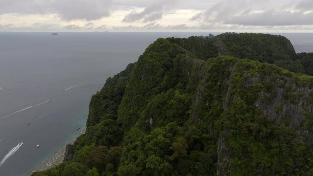 Drone footage from PhiPhi islands in Thailand footage of incredible Thai landscapes incredible nature with insane rocks, beaches, hills, ocean adn boats. Footage. filmed in 4k