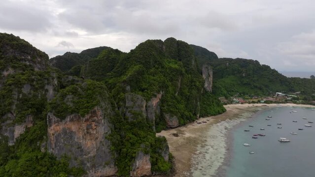 Drone footage from PhiPhi islands in Thailand footage of incredible Thai landscapes incredible nature with insane rocks, beaches, hills, ocean adn boats. Footage. filmed in 4k