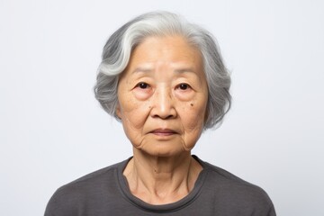 Elderly woman serious face portrait