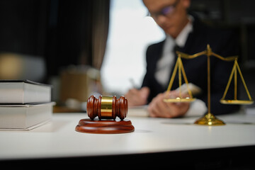 Partner lawyers or attorneys discussing a contract agreement. Successful businessmen have a contract in place to protect it,signing of modest agreements form in office...