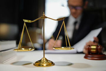 Partner lawyers or attorneys discussing a contract agreement. Successful businessmen have a contract in place to protect it,signing of modest agreements form in office...